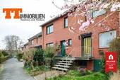 Außenansicht - Charmantes Reihenmittelhaus mit hübscher Hochterrasse in ruhiger Lage von Wilhelmshaven-Neuengroden!