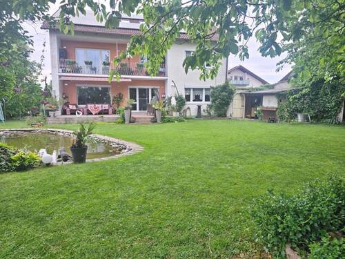 Titelbild - Zweifamilienhaus mit Ausbaureserve und Traumgarten - Viel Platz für Ihre Wohnideen!