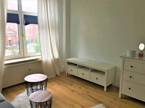 Wohnzimmer - 1 Zimmer Etagenwohnung zum Kaufen in Flensburg