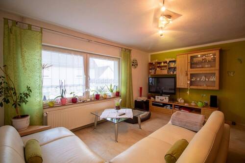Wohnzimmer - 3 Zimmer Doppelhaushälfte in Herschbach