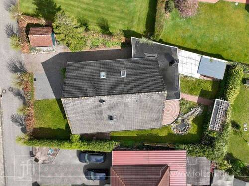 Luftbild - 6 Zimmer Einfamilienhaus zum Kaufen in Holtland