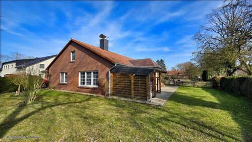 Gartenansicht Hauptgebäude - Einfamilienhaus mit Einliegerwohnung und Ausbaureserven in Triangel - Angebotsverfahren