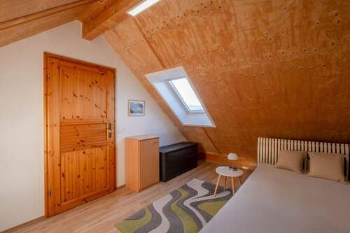 Zimmer im Dachgeschoss - 