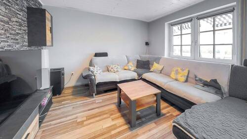 Wohnzimmer - Einfamilienhaus mit 158,00 m² in Schrecksbach zum Kaufen