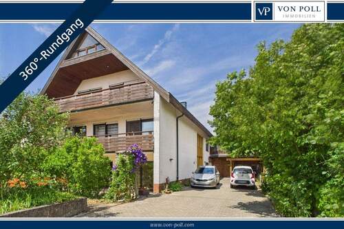 Titelbild - Mehrfamilienhaus mit wunderschönem, ruhigem Grundstück - perfekt für Mehrgenerationen