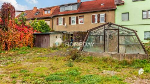 Garten 2 - Rohdiamant in ruhiger Lage: Reihenhaus mit Potenzial zur individuellen Gestaltung