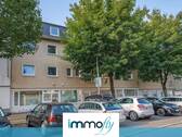 Hausansicht - Helle 4-Zimmer-Eigentumswohnung mit Garten, Tageslichtbad und flexible Raumgestaltung