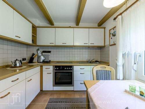 Küche mit Sitzgelegenheit - Einfamilienhaus mit 121,00 m&sup2; in Jemgum zum Kaufen