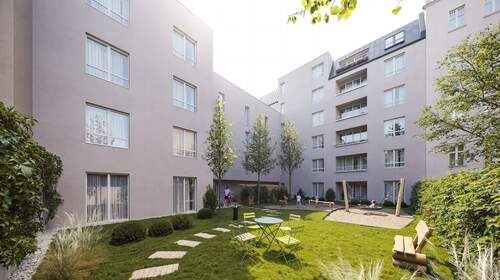 Hofansicht - Sonnige 4-Zimmer-Familienwohnung mit Süd-Loggia