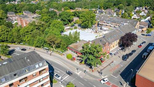Luftbild von Südosten - Mehrfamilienhaus, Wohnhaus in Glinde zum Kaufen