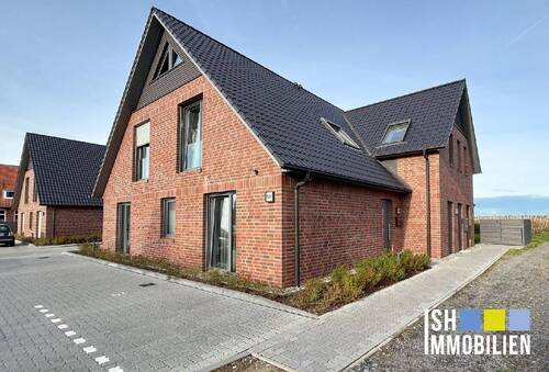 Außenansicht - Jung wohnen im Alten Land! Moderne 4-Zi-EG-Wohnung mit Blick ins Grüne