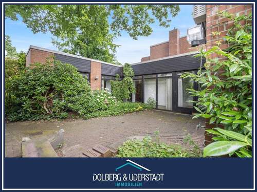 Titelbild - Wohnen auf einer Ebene: Attraktives Reihenendhaus als Bungalow mit Teilkeller und Stellplatz