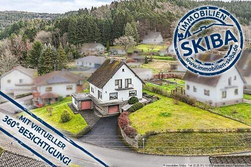 Wohnhaus in Müsch - Erhöhte Lage: Gepflegtes Wohnhaus mit Aussicht und zwei Garagen