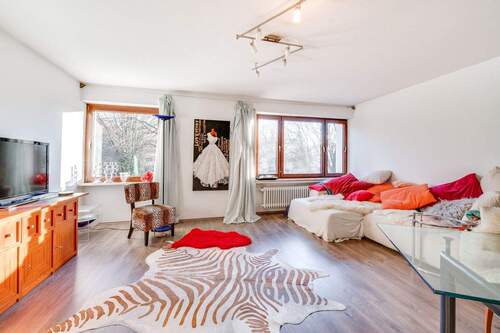 Das Wohnzimmer - AIGNER - Familienoase: Platz, Privatsphäre und Komfort auf jeder Etage