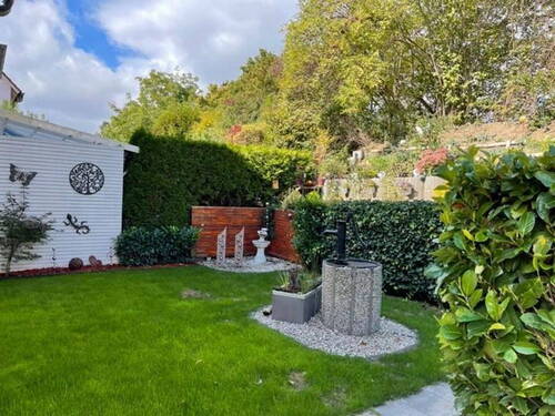 Garten - Wohnung auf 2 Etagen (EG+UG), provisionsfrei, großflächig, 2 Terrassen mit Garten und Garage