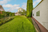 seitlicher Garten - 9 Zimmer Mehrfamilienhaus, Wohnhaus zum Kaufen in Birkenfeld