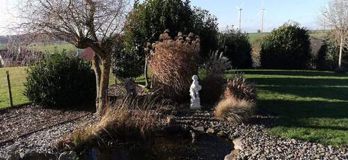 Schön angelegter Garten - 8 Zimmer Einfamilienhaus in Gilzem