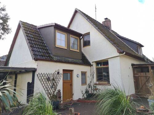 hintere Ansicht - Einfamilienhaus mit 108,30 m² in Varel zum Kaufen