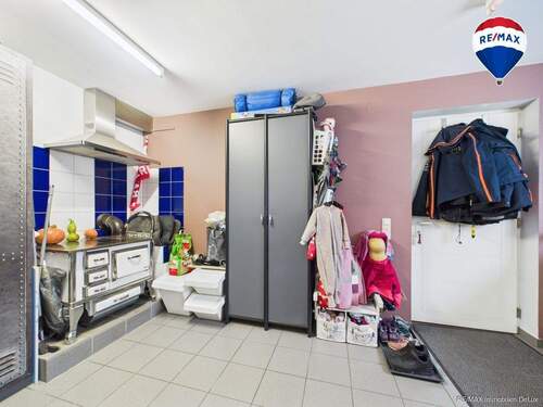 RE/MAX Immobilien DeLux Einfamilienhaus Mettlach-Weiten Waschraum - 