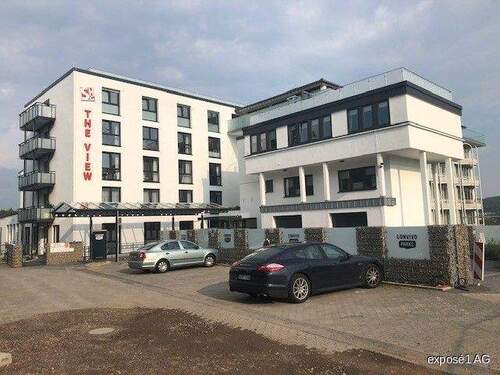 Nordansicht--Eingang-1 - Pflegewohnung - Wohnen Sie im kernsaniertem THE VIEW.