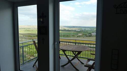 Aussicht Wohnzimmer mit Balkon - 