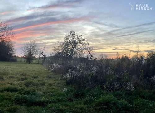 Wunderschön gelegen... - Sonnenuntergänge inklusive: Traumhaftes Randlage-Baugrundstück für DHH in Schweinheim