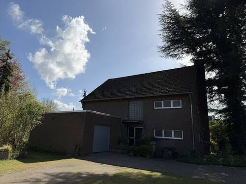 Eingangsansicht - Einfamilienhaus mit 200,00 m&sup2; in Rheinberg zum Kaufen
