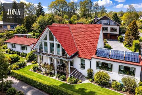 Luftbild - Doppelter Wohnwert: Einfamilienhaus mit separater Wohneinheit