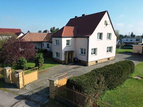 Ansicht schräg - Einfamilienhaus mit 138,00 m&sup2; in Laußig zum Kaufen