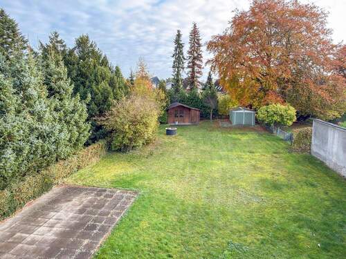 Blick in den Garten - Einfamilienhaus mit 82,10 m² in Uetersen zum Kaufen