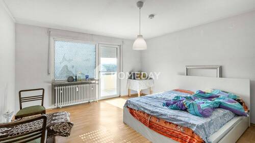 Wohnzimmer 1 - 3 Zimmer Etagenwohnung zum Kaufen in Bad Vilbel