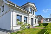 Fassade seitlich - 4 Zimmer Einfamilienhaus zum Kaufen in Hamburg