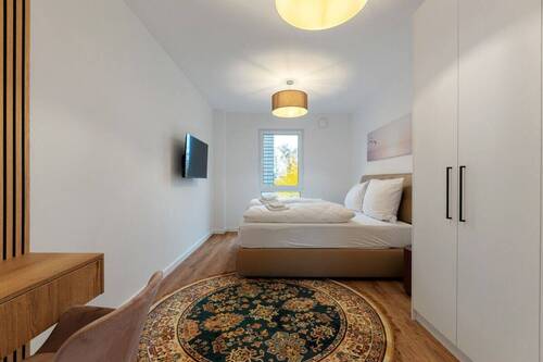 Schlafen - Sonnige, möblierte Ferienwohnung mit Sauna KFN Standard