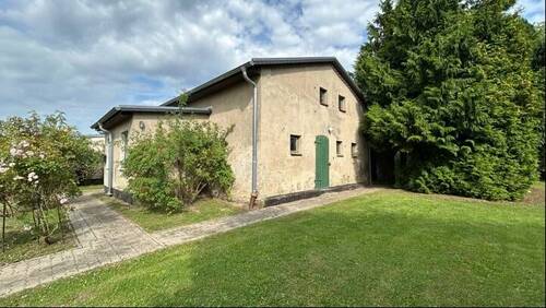 Ansicht mit Garten - Doppelhaushälfte mit 70,00 m&sup2; in Ziesendorf zum Kaufen