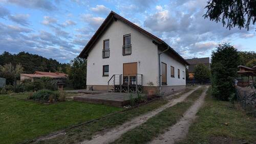 Bild 2 - 7 Zimmer Mehrfamilienhaus, Wohnhaus zum Kaufen in Zühlsdorf
