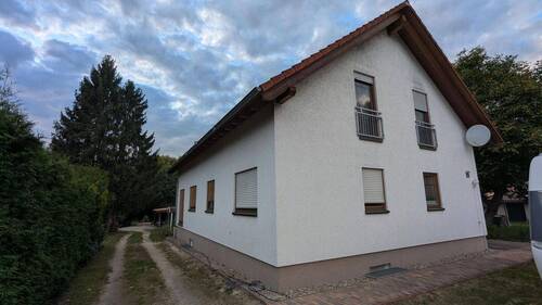 Bild 3 - 7 Zimmer Mehrfamilienhaus, Wohnhaus in Zühlsdorf