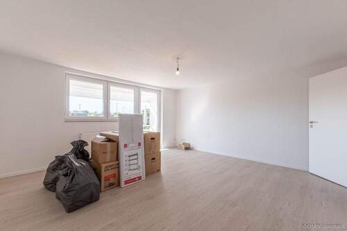 Wohnzimmer_2.OG WHG 7 - 2 Zimmer Mehrfamilienhaus, Wohnhaus in Uetze