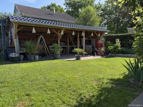Gartenhaus - Einfamilienhaus mit 217,00 m&sup2; in Wiefelstede / Ofenerfeld zum Kaufen