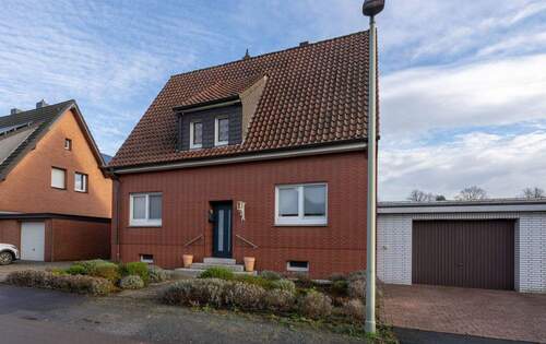 Frontansicht - Zuhause ankommen und wohlfühlen: Einfamilienhaus mit Einliegerwohnung und großem Garten in Selm