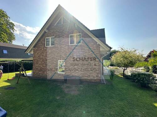 Seitenansicht - 6 Zimmer Einfamilienhaus zum Kaufen in Bassum