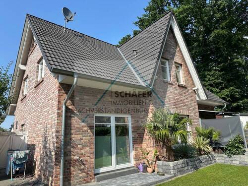 Ansicht seitlich - 6 Zimmer Einfamilienhaus in Bassum