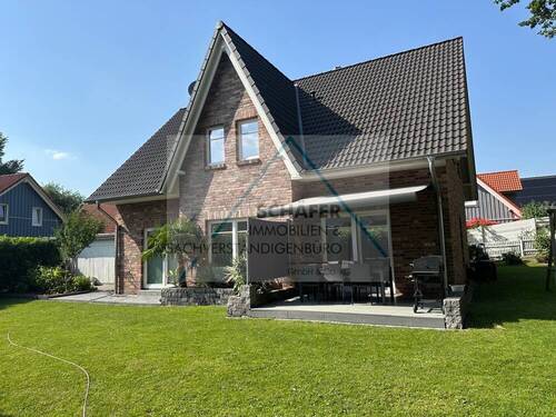 Ansicht von hinten - Einfamilienhaus mit 152,70 m² in Bassum zum Kaufen