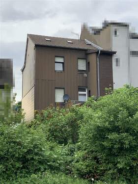 Rückansicht Gebäude - Mehrfamilienhaus in zentraler Lage