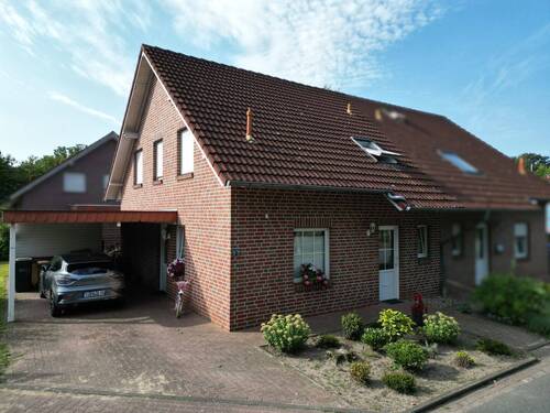 Bild 1 - Gemütliche Doppelhaushälfte in verkehrsberuhigter Lage von Hopsten (2)