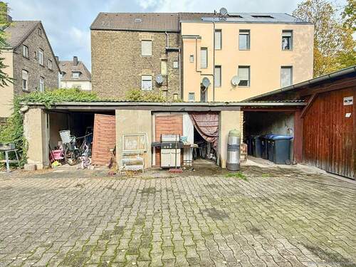 Garagen im Hinterhof - 1 Zimmer Mehrfamilienhaus, Wohnhaus zum Kaufen in Hamm
