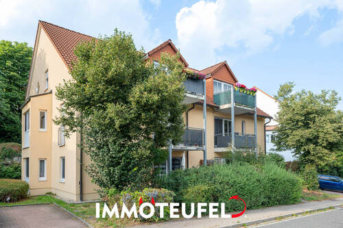 Straßenansicht - Gepflegte Eigentumswohnung mit Terrasse und Stellplatz - ideal für Eigennutzer oder Anleger