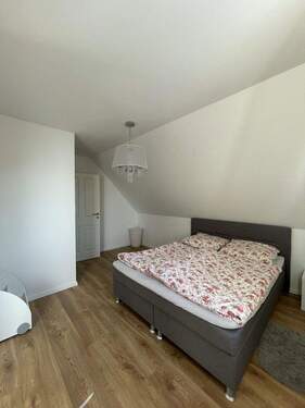 Schlafzimmer im Dachgeschoss - 