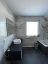 Badezimmer im Dachgeschoss - 