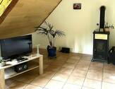 Wohnzimmer mit Ofen OG - 