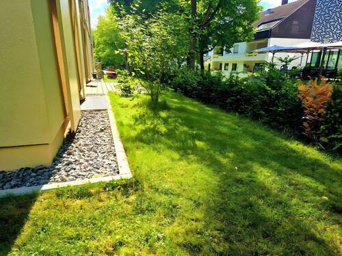 Bild 1 - Exklusive Whg. mit Garten und hochwertiger Einbauküche
